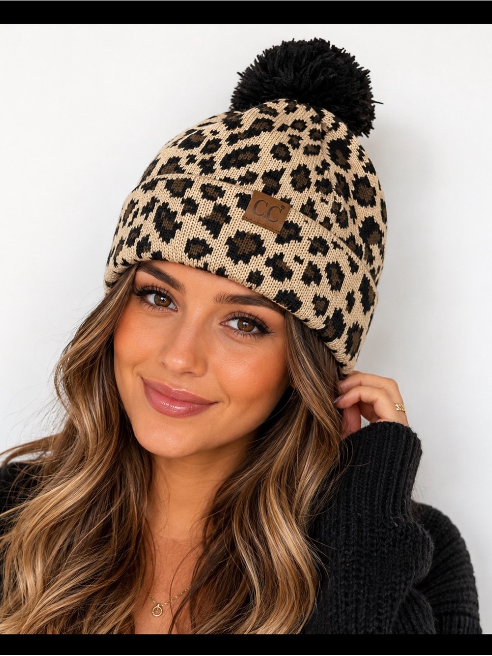 CC hat beanie cheetah leopard print poof ball winter cold warmth snow ski
